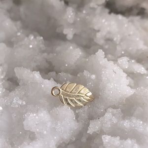 3/$30 new gold plated leaf charm